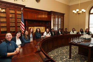 Barbara Lee Fellows celebrate at the State House on April 29, photograph by Bella Yee '24.