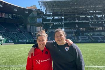 Laura Doran and her colleague, Isabella Pino, at Providence Park in Portland, Oregon