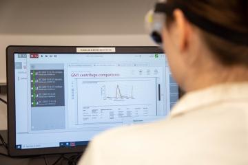 A student evaluating chemistry research on a computer. Photo by Ashley Purvis.