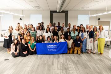 The group of NECC staff who took part in the summer poster session in 2026