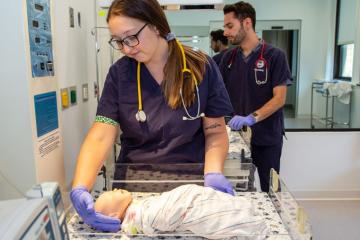 Nursing student working in model maternity ward