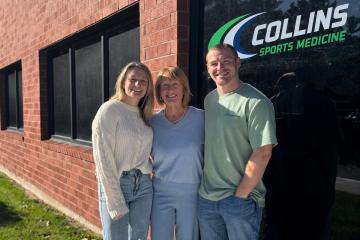 Carole Collins ’83 with her children, Kelsey and Jake, outside Collins Sports Medicine