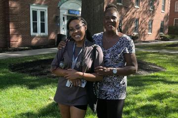 Leslie Morris and Sasha Oglesby on the Simmons campus