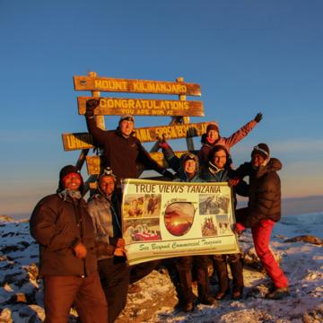 Megan Ludgate summiting Mount Kilimanjaro in Tanzania.