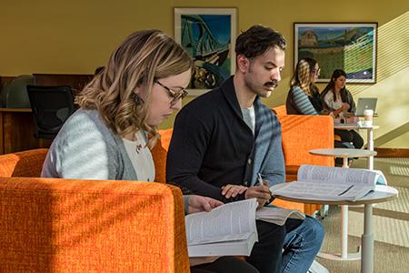 Students studying in the library's quiet study room.