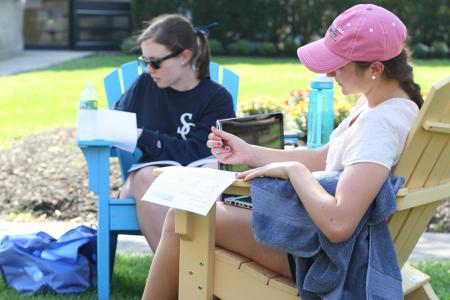 Students sitting on the quad