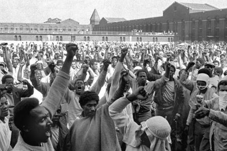 African American men during a prison rebellion