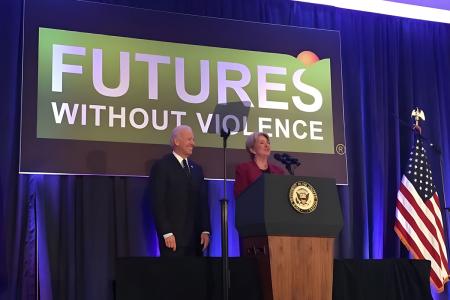 Esta Soler and President Biden celebrate the nation's progress toward keeping women and families safe. 