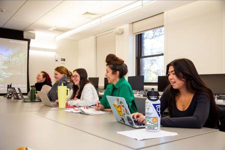 Assistant Professor Kat Lombard-Cook working with Studio 5 students, photograph by Ashley Purvis.