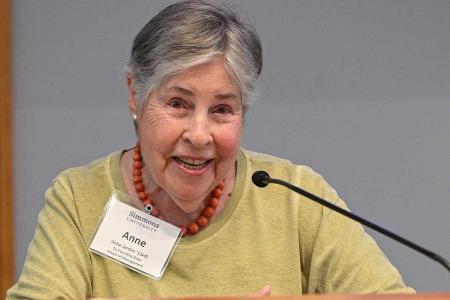 Anne Jardim ’13HD at the podium during her 90th birthday celebration at Simmons University