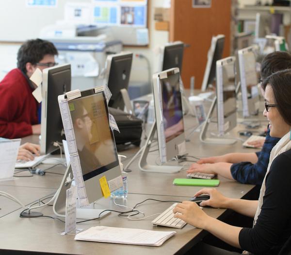 Students working at computers in a computer lab