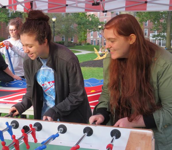 Students playing a game on the residential quad