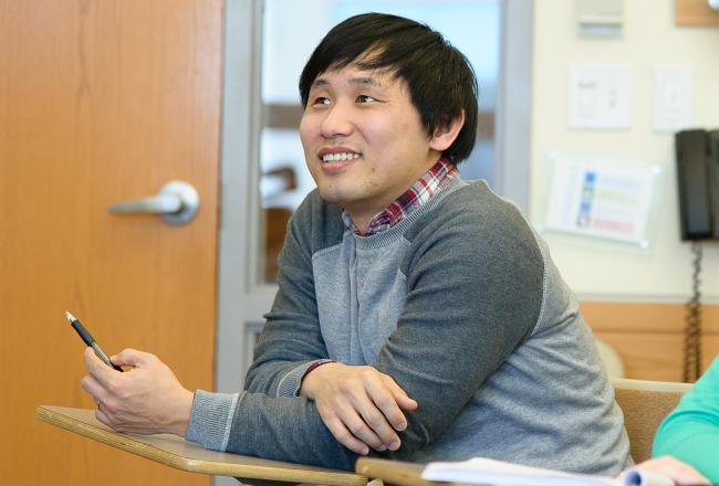 Graduate student sitting in class