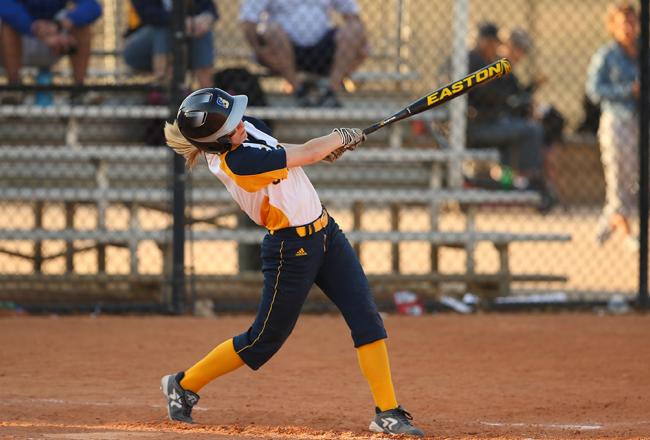 Hannah Cunningham at the bat during softball game.