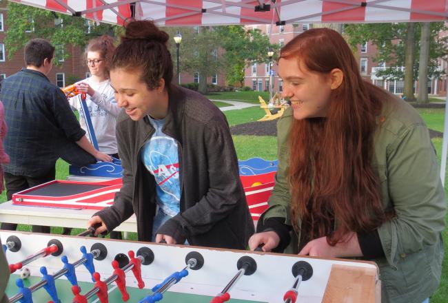 Students playing a game on the residential quad