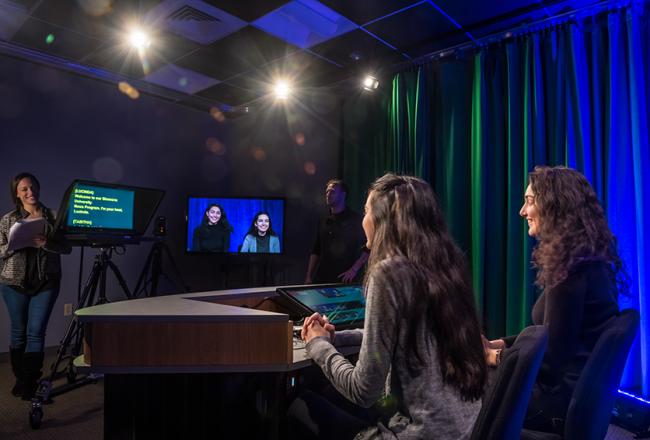 Students being filmed in the video studio