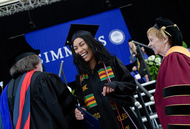 A Simmons student graduating at Commencement