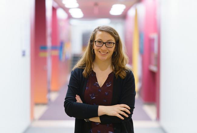 Student standing in the hall