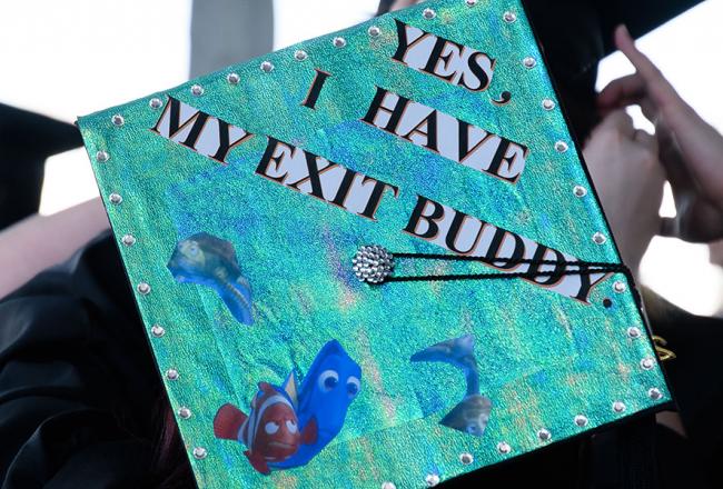 Graduation cap that reads "Yes, I have my exit buddy"
