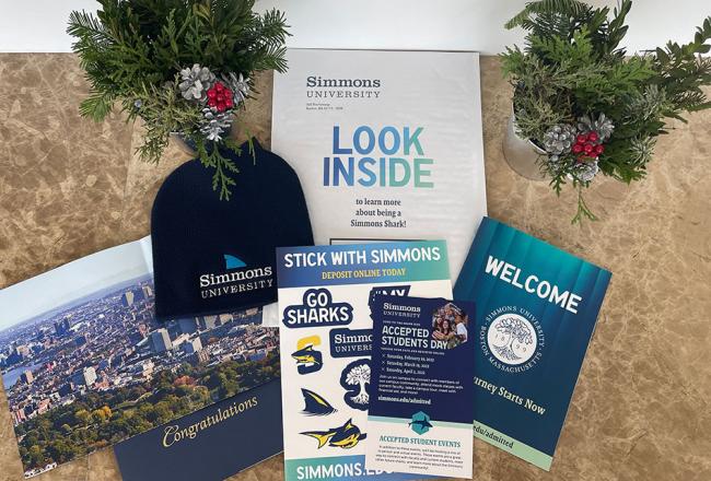 Different marketing materials that advertise Simmons University