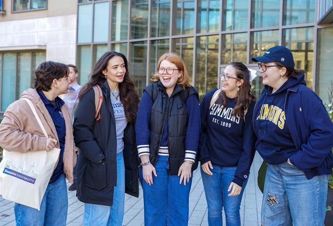 Students outside of Drinan Hall