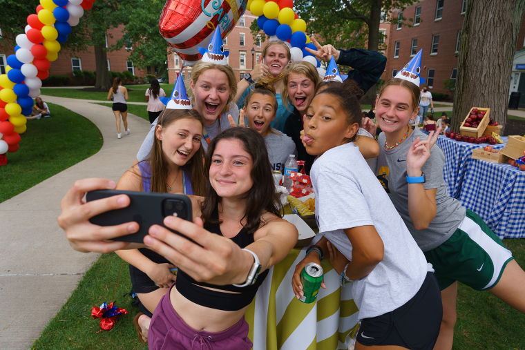 A group of Simmons students taking a selfie during Orientation