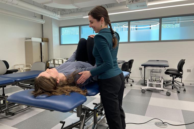 Amanda Michel ’23, ’25DPT in action in the PT lab at Simmons