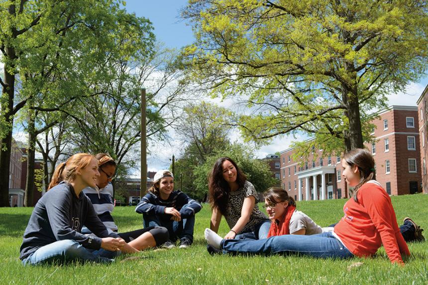 Students sitting on the quad