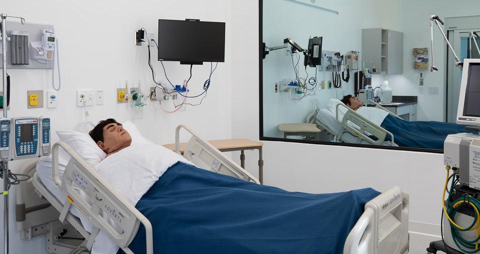 Mannequin in bed in simulation lab