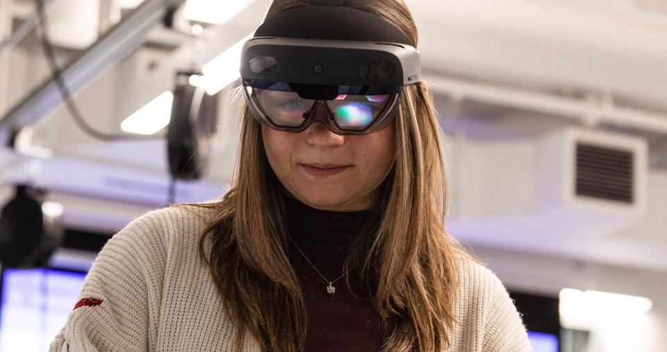 Woman wearing Hololens goggles