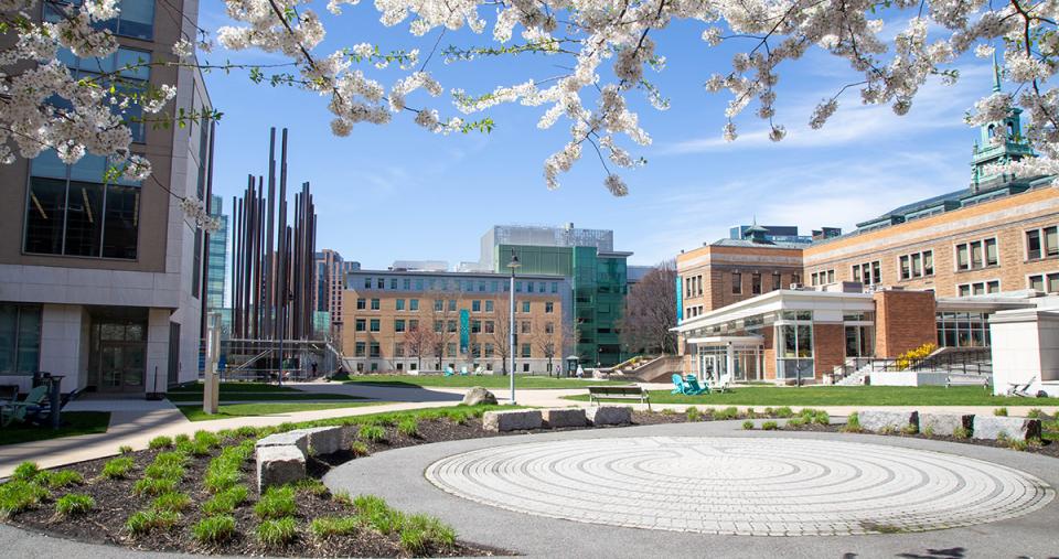 The Simmons academic campus in Spring, 2024.  The construction of the new Living Learning Center is visible.