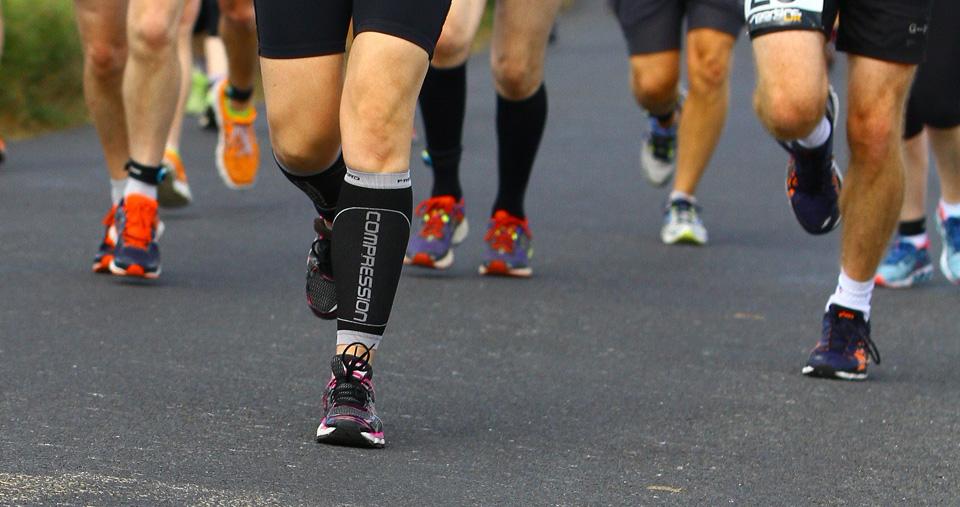 Runners on path - view from waist down