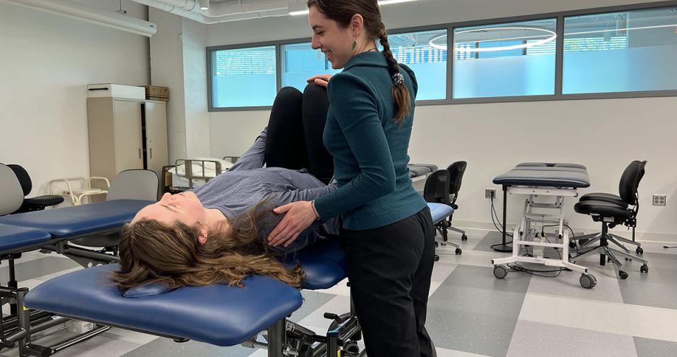 Amanda Michel ’23, ’25DPT in action in the PT lab at Simmons
