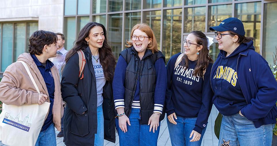 Students outside of Drinan Hall
