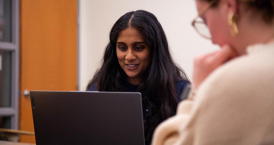 Woman working on laptop computer
