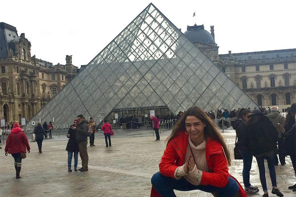 Kaitlyn Lapeyre in front of the Louvre.