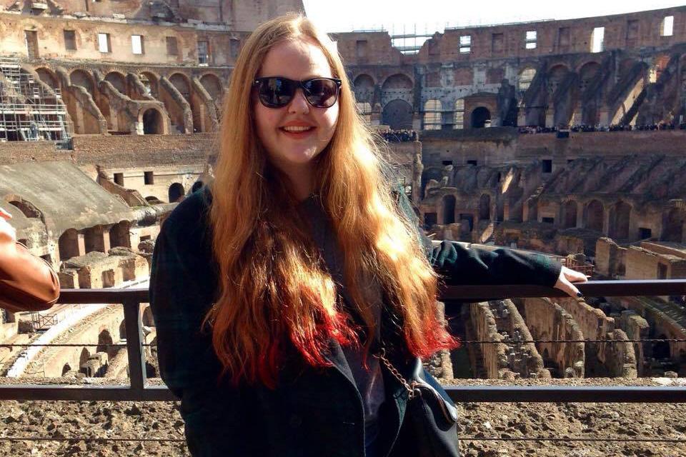 Kallie visiting the Colosseum in Rome while studying abroad.