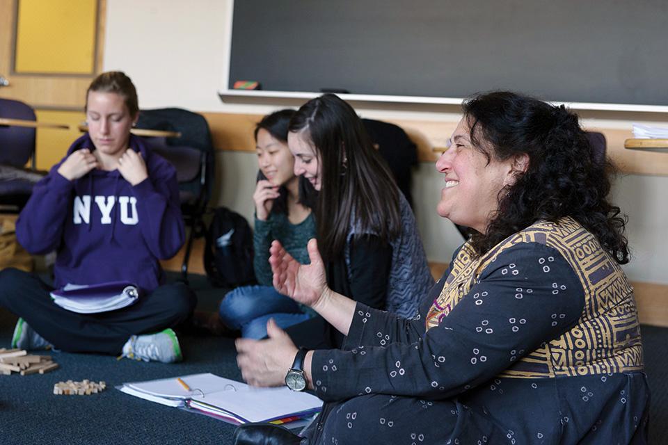 Education students sit in a circle during class.