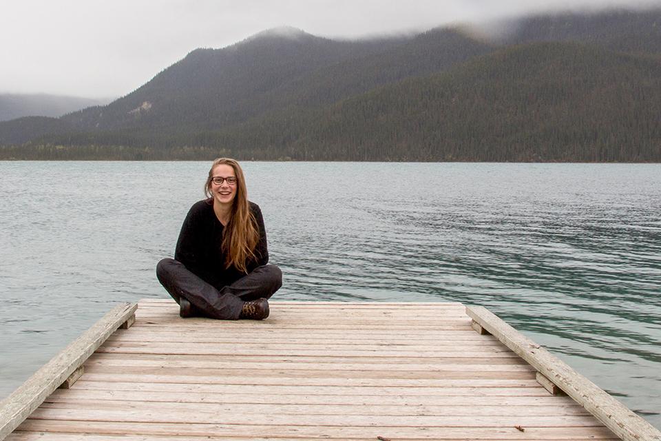 Megan Ludgate sitting on a dock.