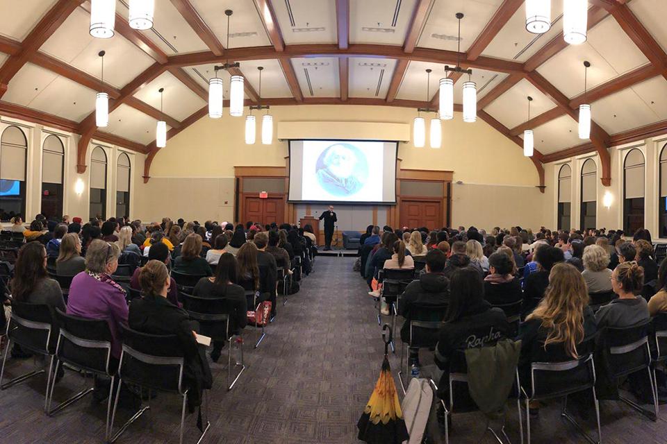 Shaun King speaking at Simmons