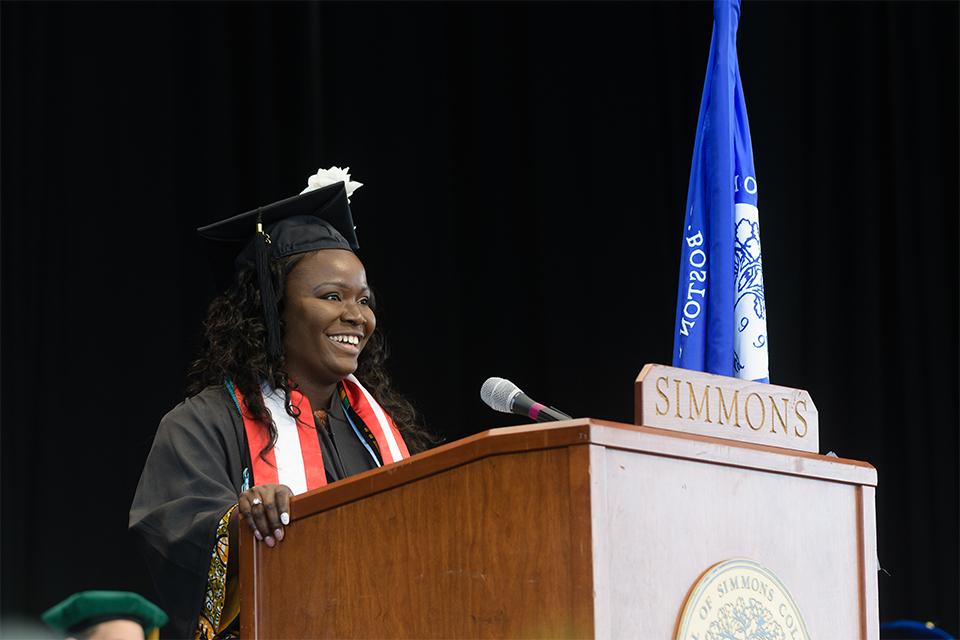 Tozoe Marton speaking at commencement.