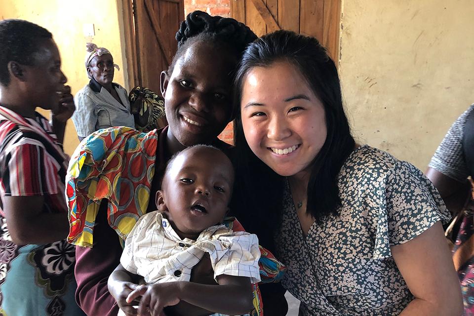 Donata Liu with a Malawian woman and her child.