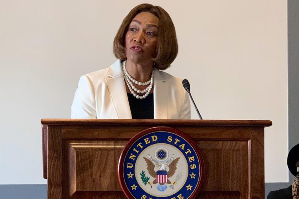 Dean Lepaine Sharpe-McHenry speaking at congressional briefing.