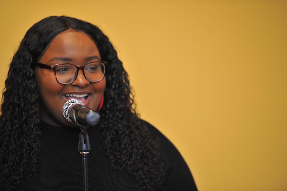 Kara Walsh speaking at the Gwen Ifill Stamp Celebration