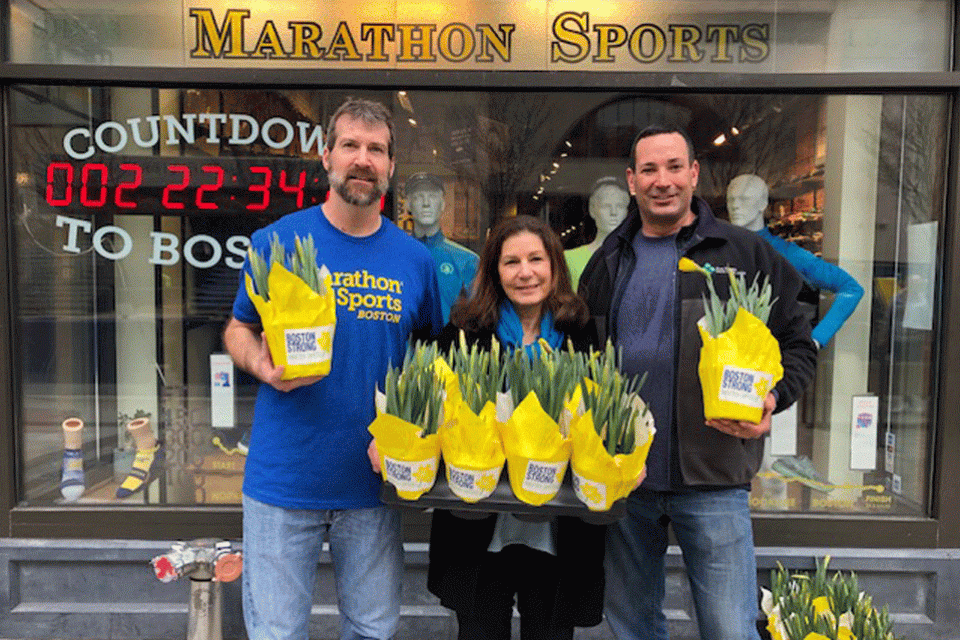 Shane O’Hara, manager of Marathon Sports, Diane Valle, founder of Marathon Daffodils, and Matt Piscitelli, Co-owner of Olson Greenhouse