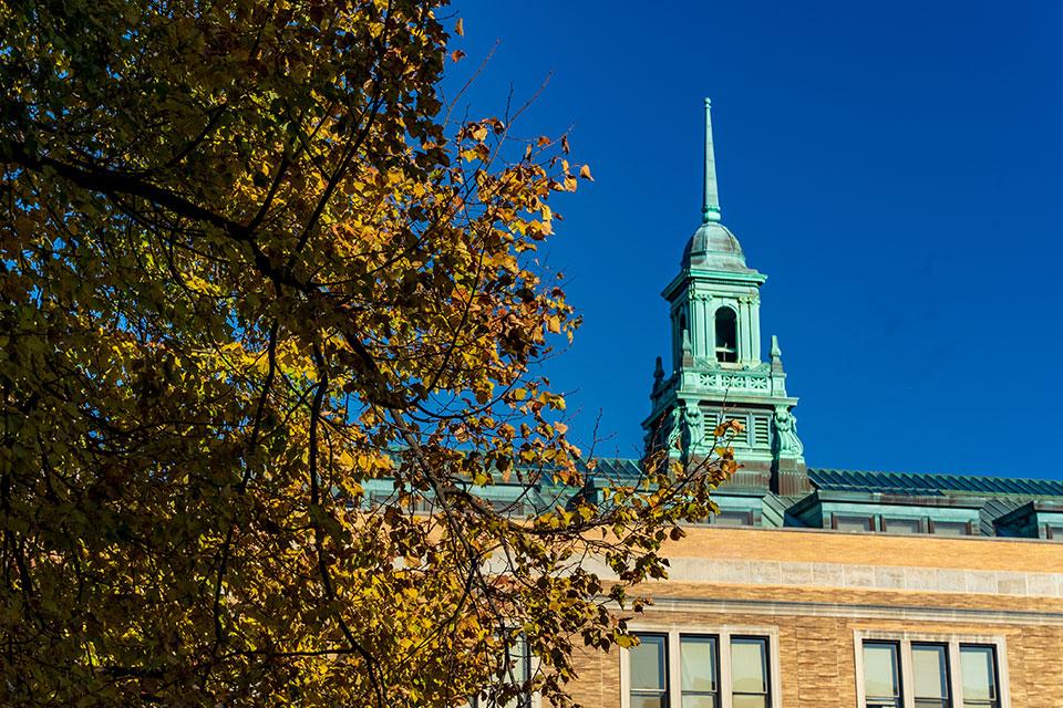 The cupola on top of the Main College Building at Simmons University in the fall.