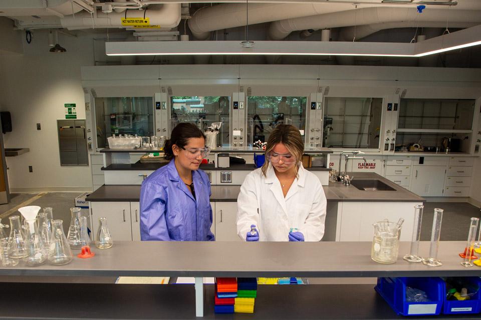 Two students working in Science Center lab